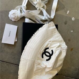 CHANEL White Hat with Black Emblem